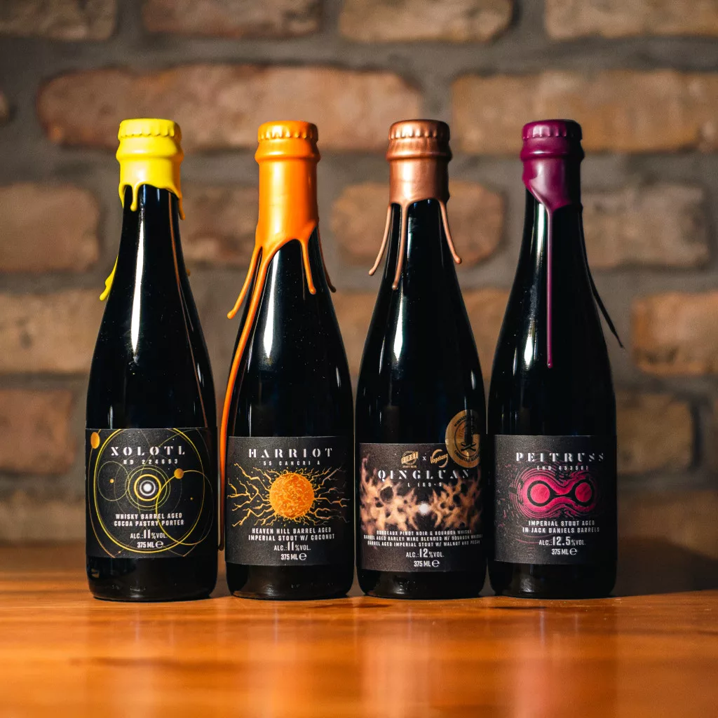4 bottles of barrel-aged specialty beer